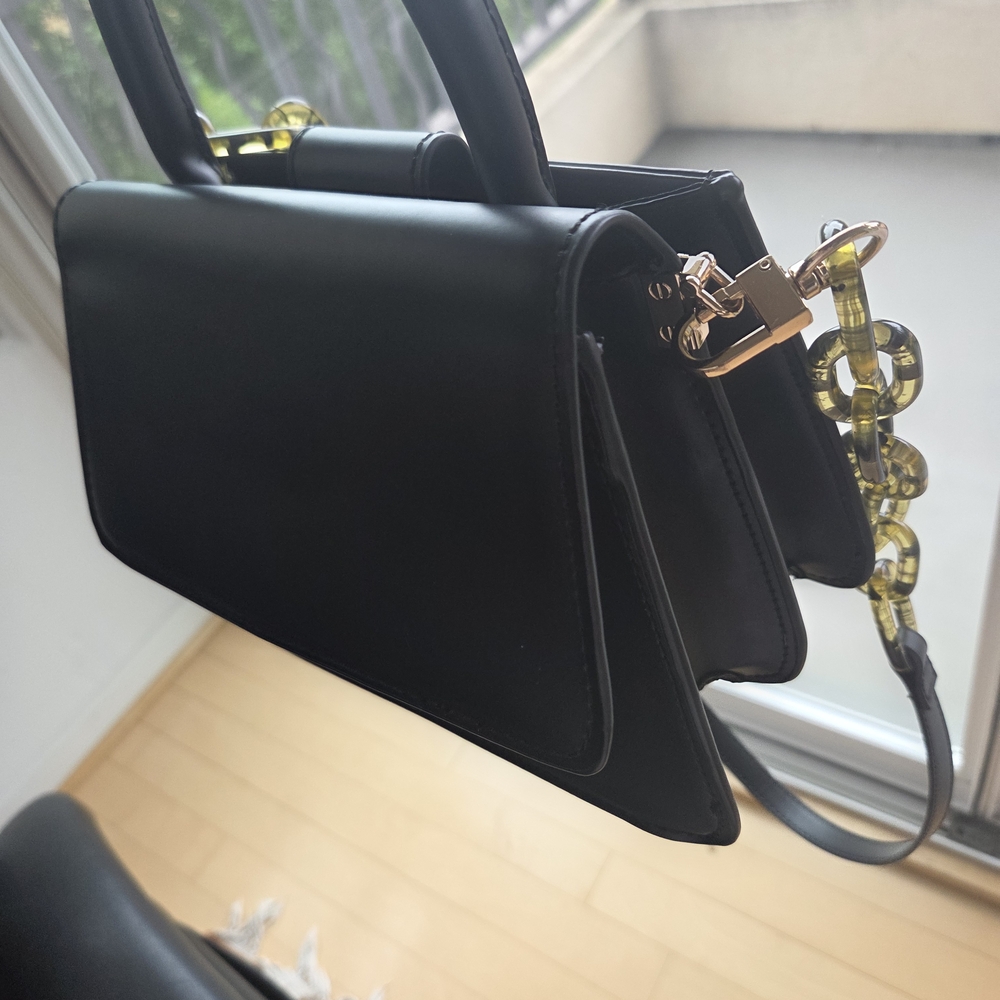 Chic Black Shoulder Bag with Gold Accents